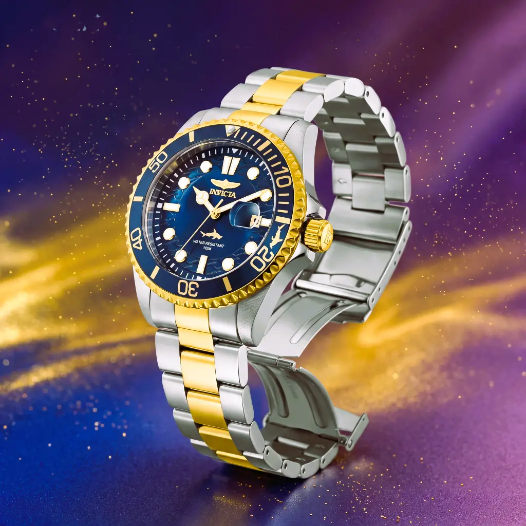 Invicta Mens Pro Diver Quartz Watch Invicta Pro Diver quartz timepiece featuring a blue rotating bezel and metal strap.